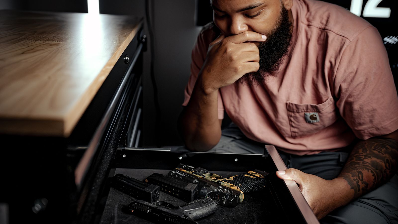 Reviewing pistols in secure tool-chest storage